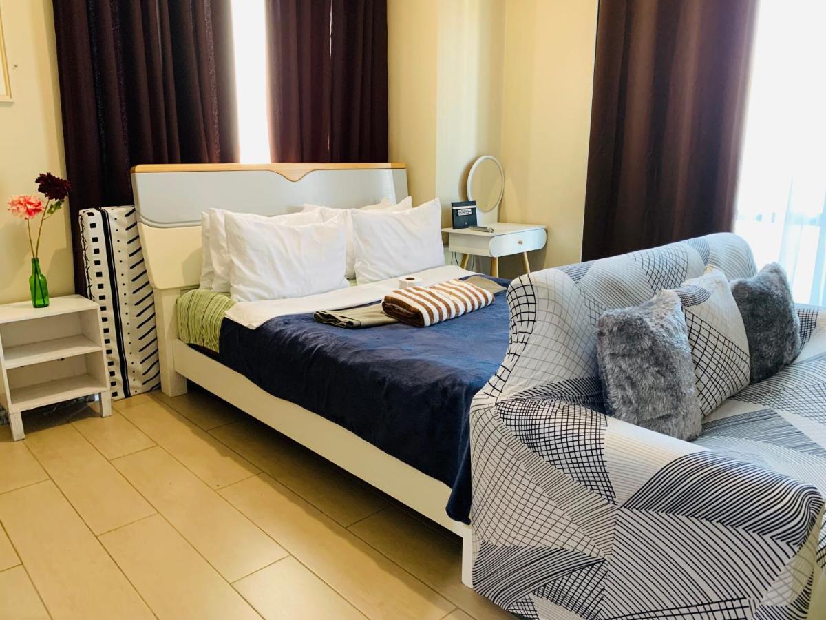 Two Palm Tree Villas Condominium - Studio 8Th Fl With Balcony - Across Terminal 3 Airport 帕赛 外观 照片