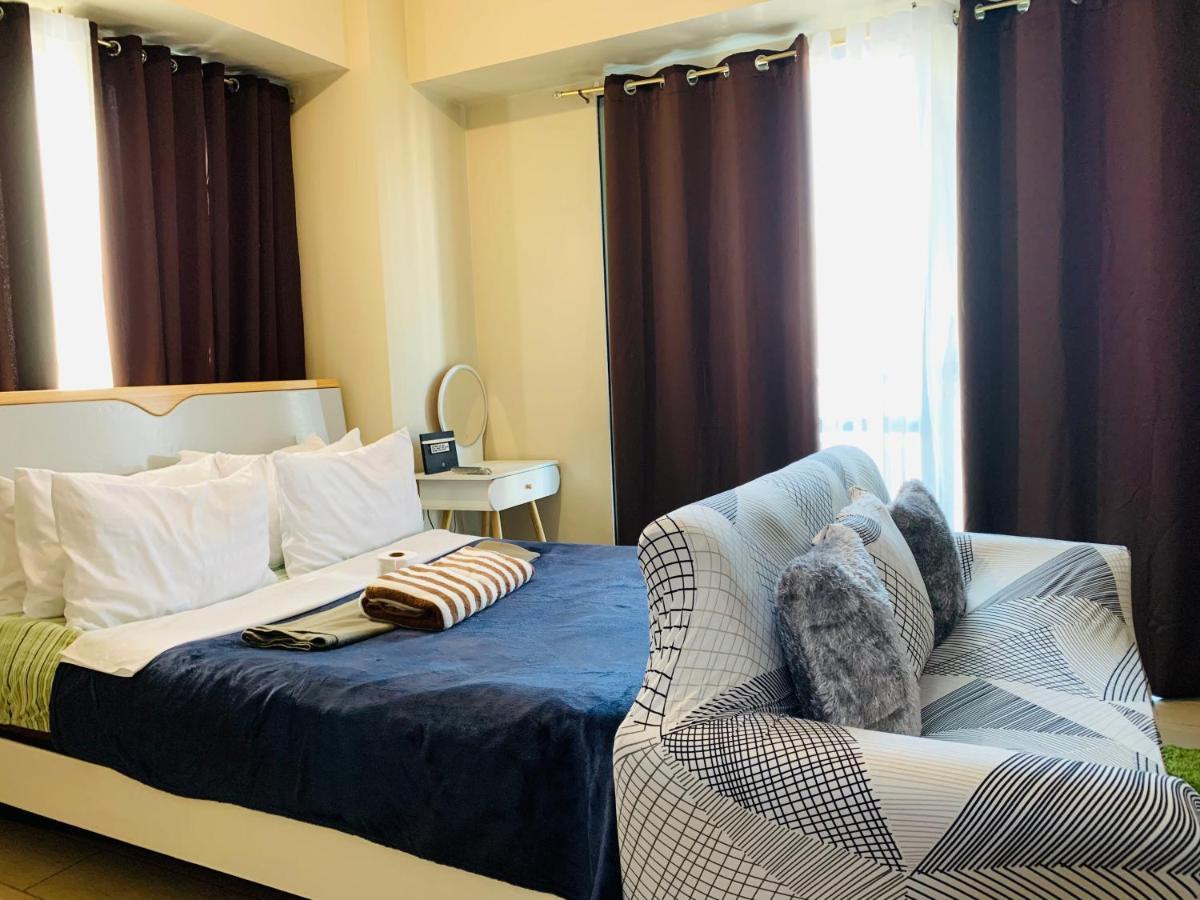 Two Palm Tree Villas Condominium - Studio 8Th Fl With Balcony - Across Terminal 3 Airport 帕赛 外观 照片